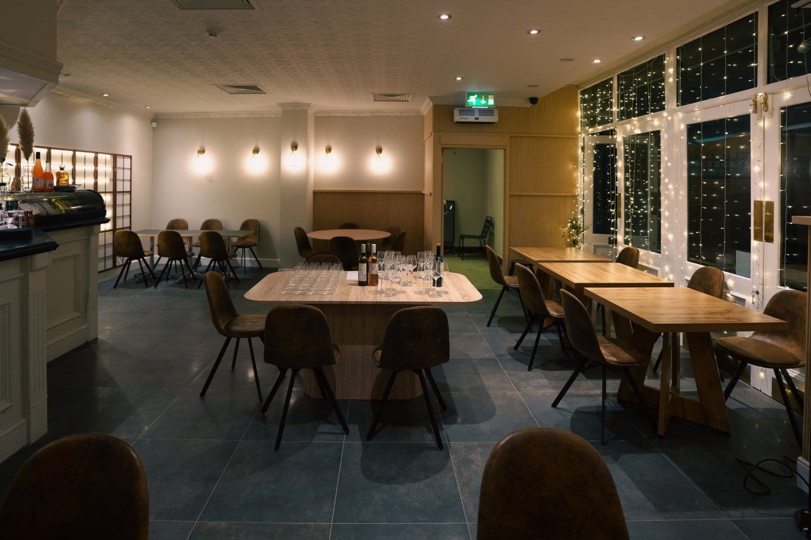 The Azuki Room dining room lit with fairy lights in the evening