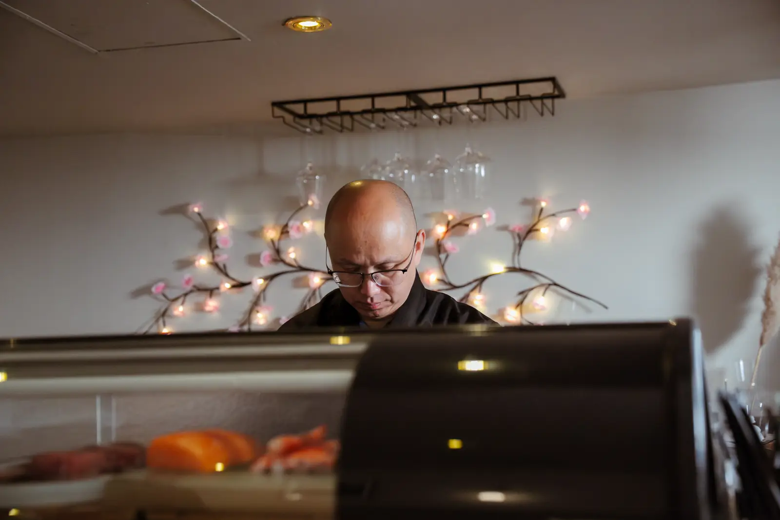 Sushi chef at the counter